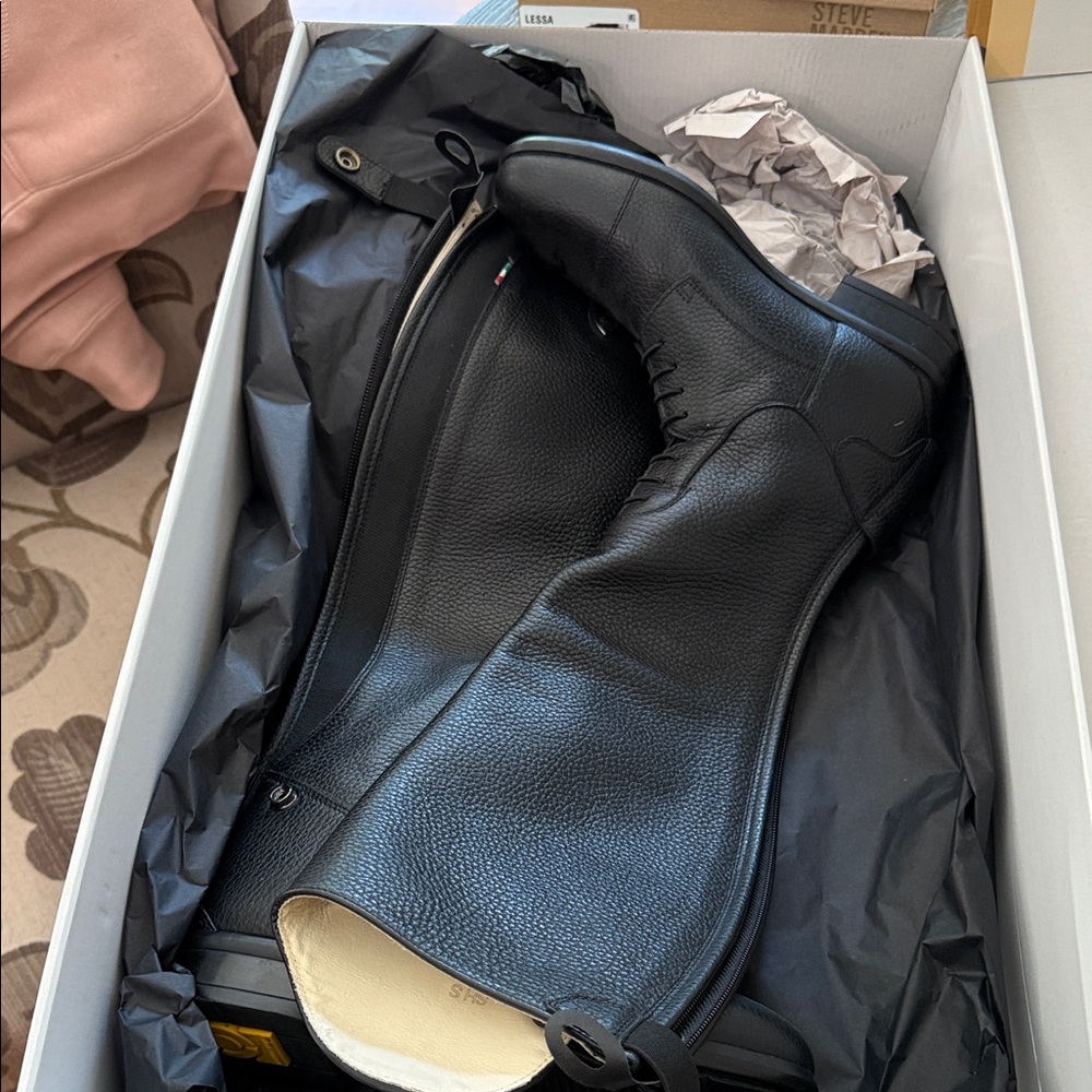 Black Leather Riding Boots with Snap Closure